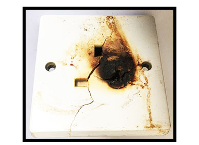 burnt out electrical socket