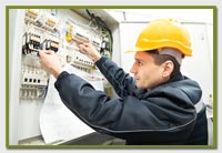 electrician fixing a fuse box