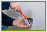 electrician fixing in a new plug point