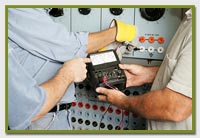3 electricians testing electricla circuits